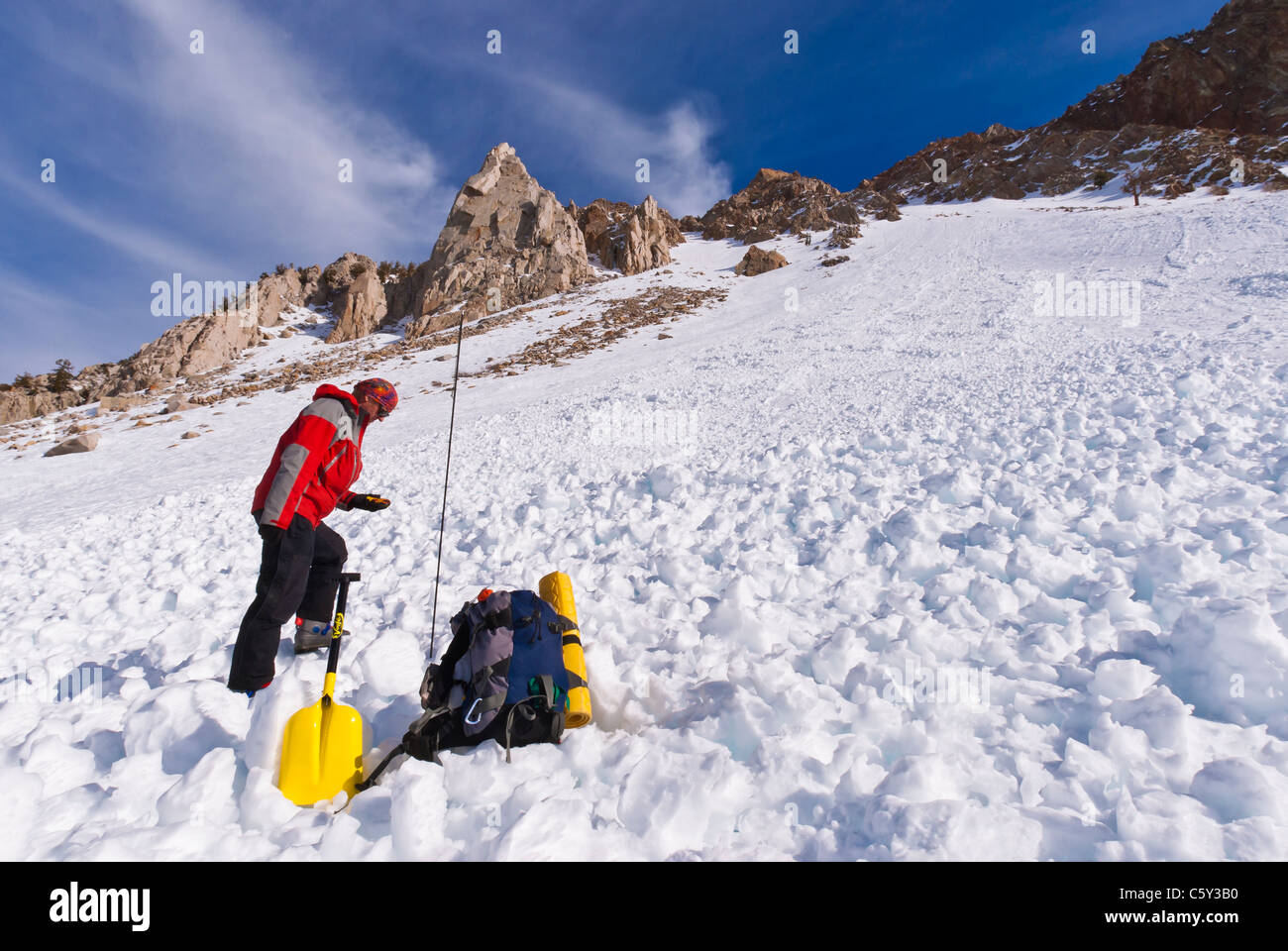 Backcountry skier using avalanche gear hires stock photography and