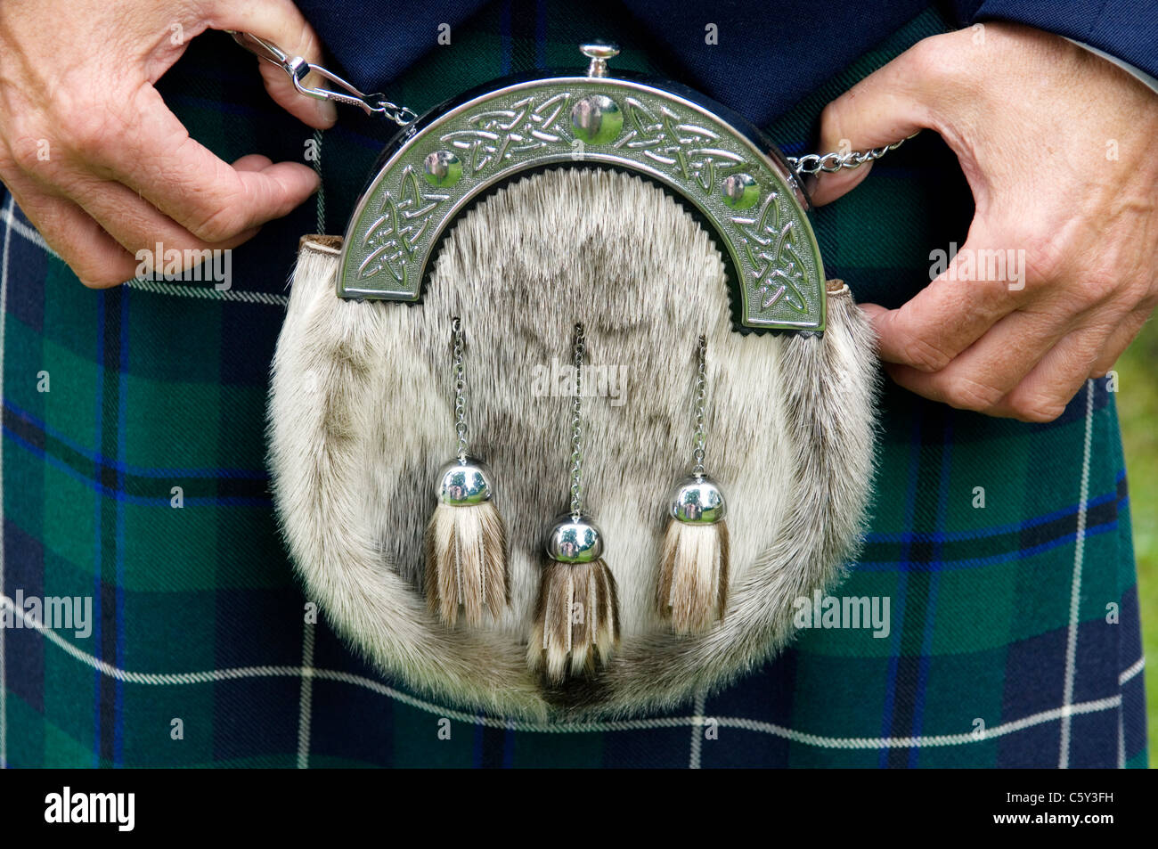 A sporran, a purse or pouch worn around the waist over a kilt. Part of male traditional Scottish national dress costume Stock Photo