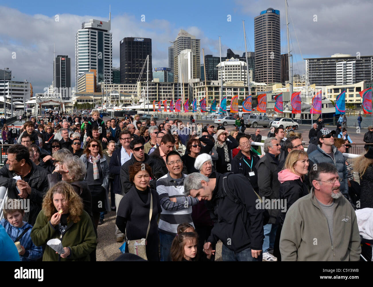 Crowds waiting for the Wynyard Crossing bridge to open, Viaduct Harbour, Auckland New Zealand Stock Photo