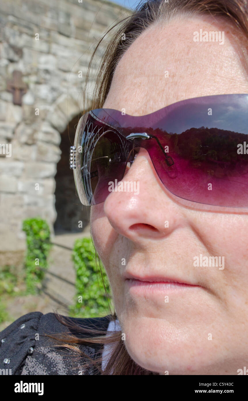 The Iron bridge at Ironbridge, Shropshire, England, seen reflected in sunglasses Stock Photo