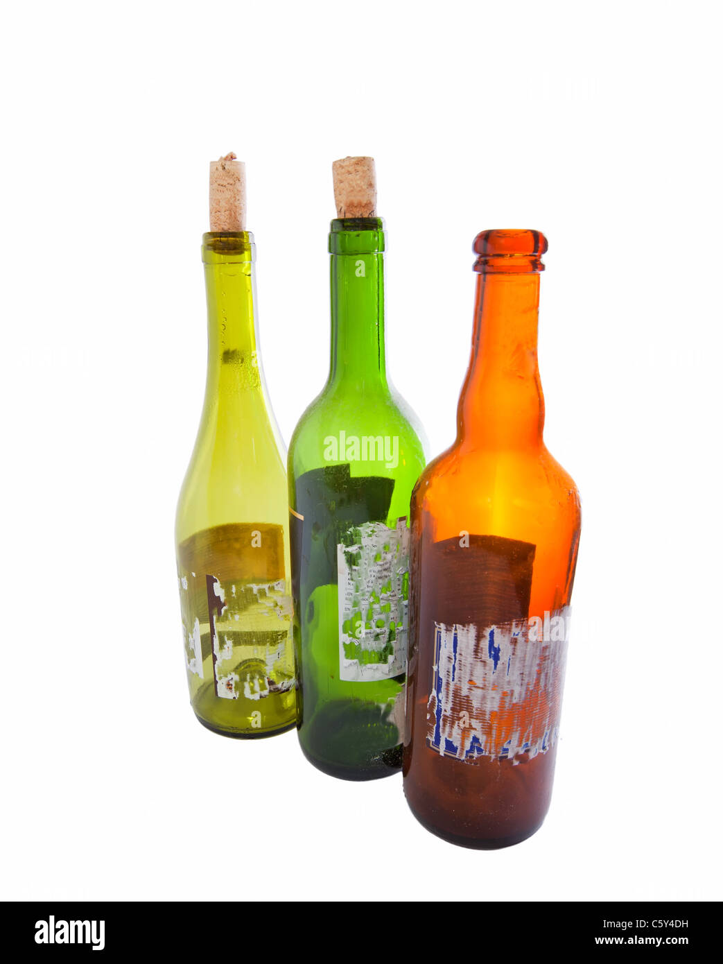 Three empty wine bottles isolated on white background Stock Photo - Alamy