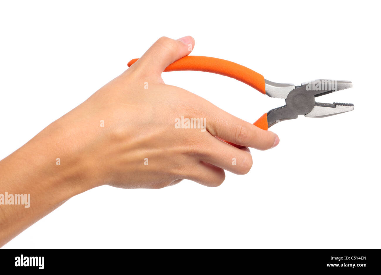 A female hand holding a pair of pliers on an isolated white background