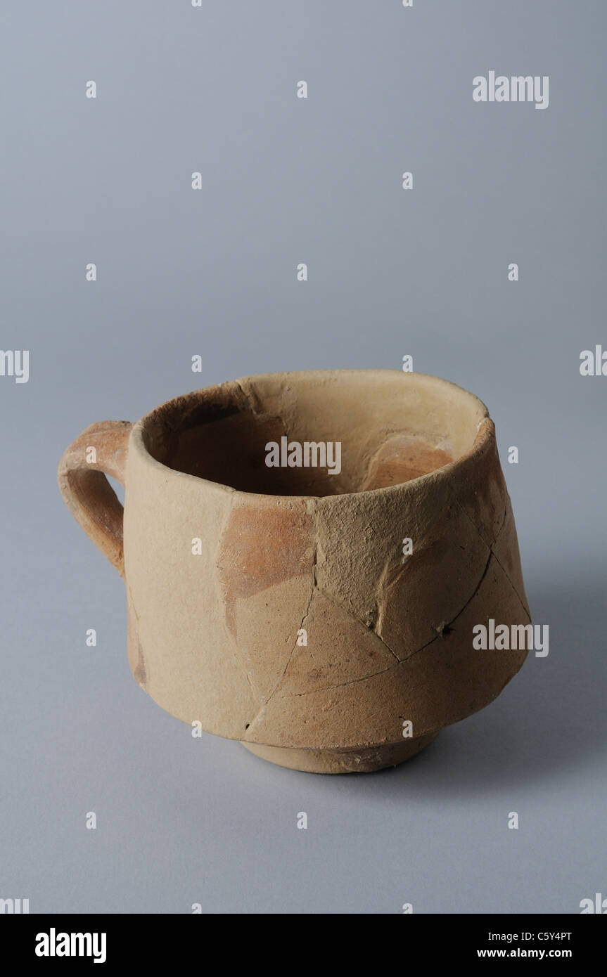 Bisque ceramic cup decorated with iron oxide. Medieval period in  ' Burgo de Santiuste Museum'- SPAIN Stock Photo