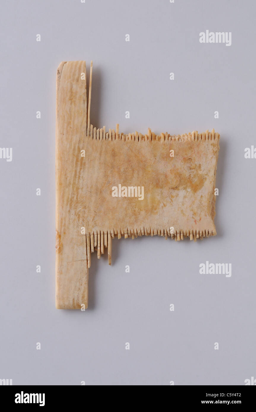 Nit of bone. 5 cms x 3, 5 cm Thickness 0.2 cm (12th- 14 th) - Medieval period in  ' Burgo de Santiuste Museum'- SPAIN Stock Photo
