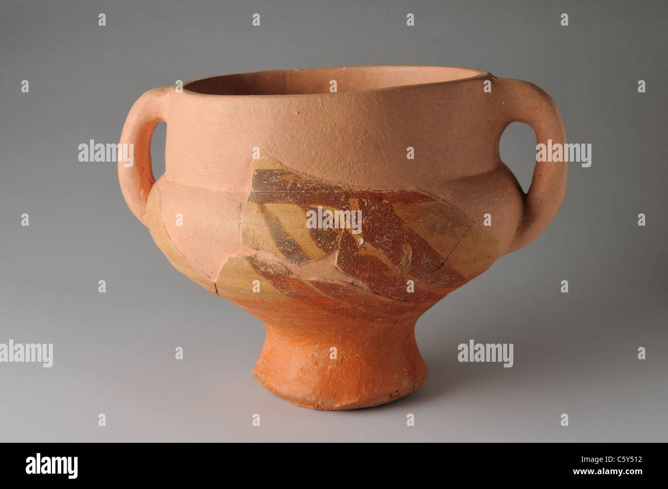 Repopulation Cup with two handles . Medieval period in  ' Burgo de Santiuste Museum'- SPAIN Stock Photo