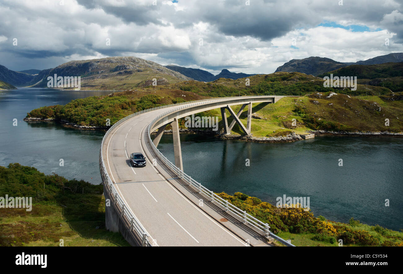 A car on the Kylesku Bridge, Sutherland, Highland, Scotland, UK. Stock Photo