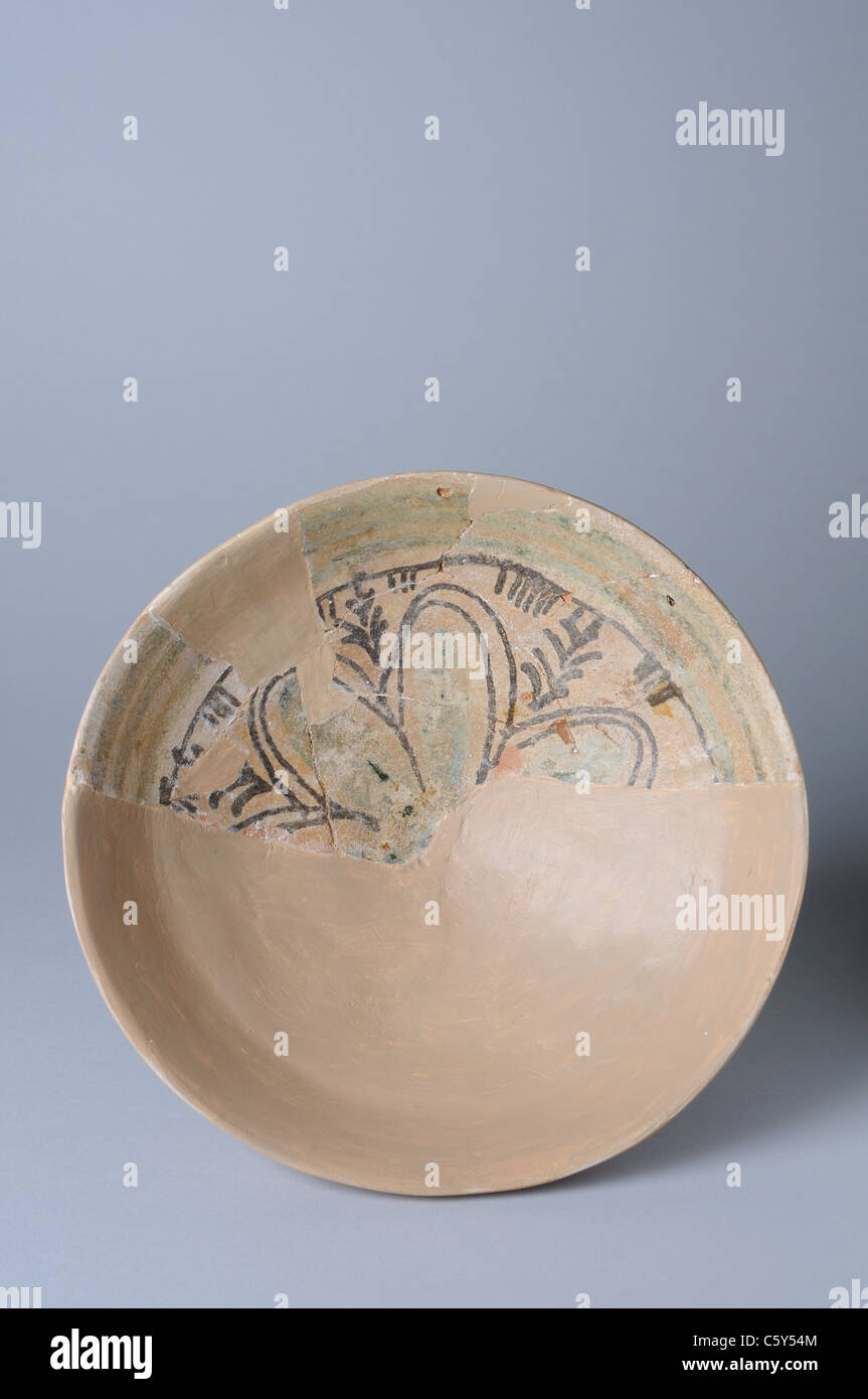 Glazed ceramic dish . Medieval period in  ' Burgo de Santiuste Museum'- SPAIN Stock Photo
