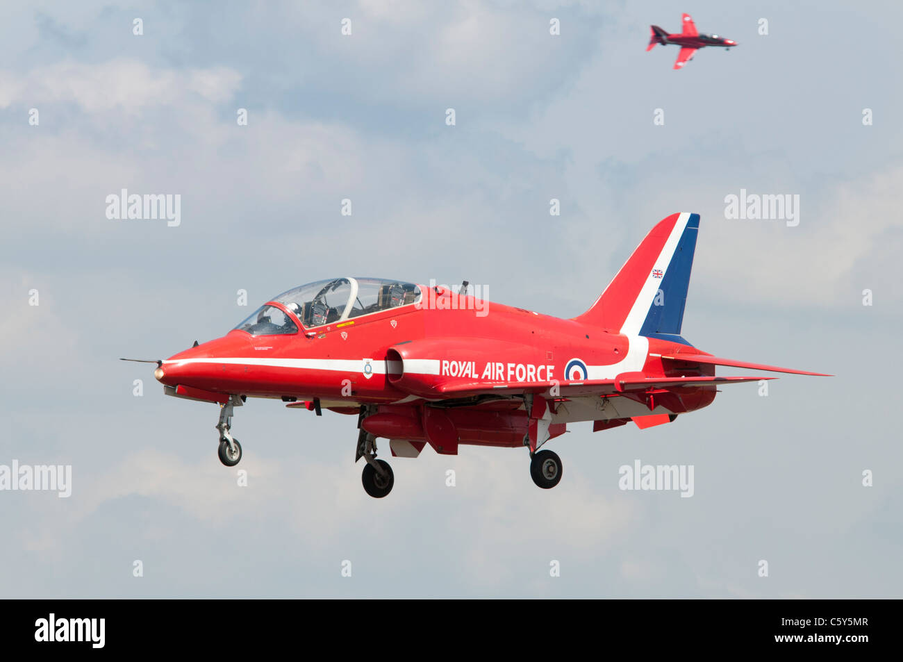 British Aerospace Hawk T1 jet trainer of the Royal Air Force aerobatic display team the Red Arrows on finals to land at Fairford Stock Photo