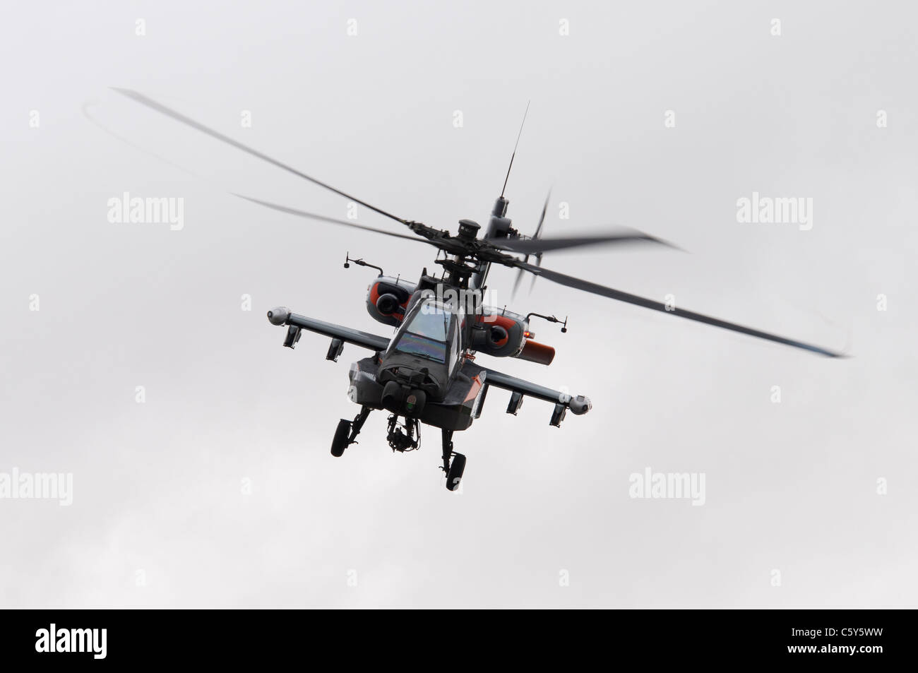 Boeing Apache AH-64D attack helicopter Q-17 from the Royal Netherlands Air Force Gilze-Rijen displays at the 2011 Air Tattoo Stock Photo