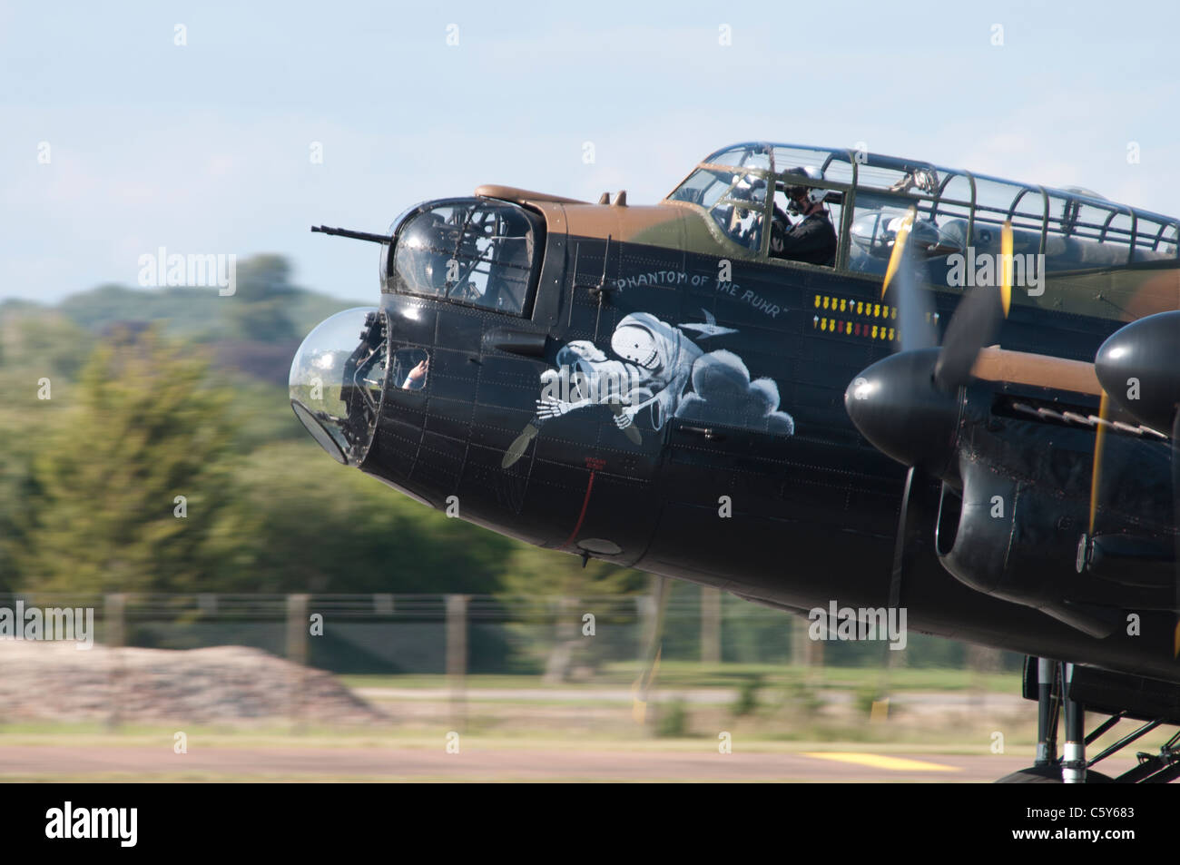 Battle of Britain Memorial Flight Lancaster ' The Phantom Of The Ruhr' taxis at the 2011 Royal International Air Tattoo. Stock Photo