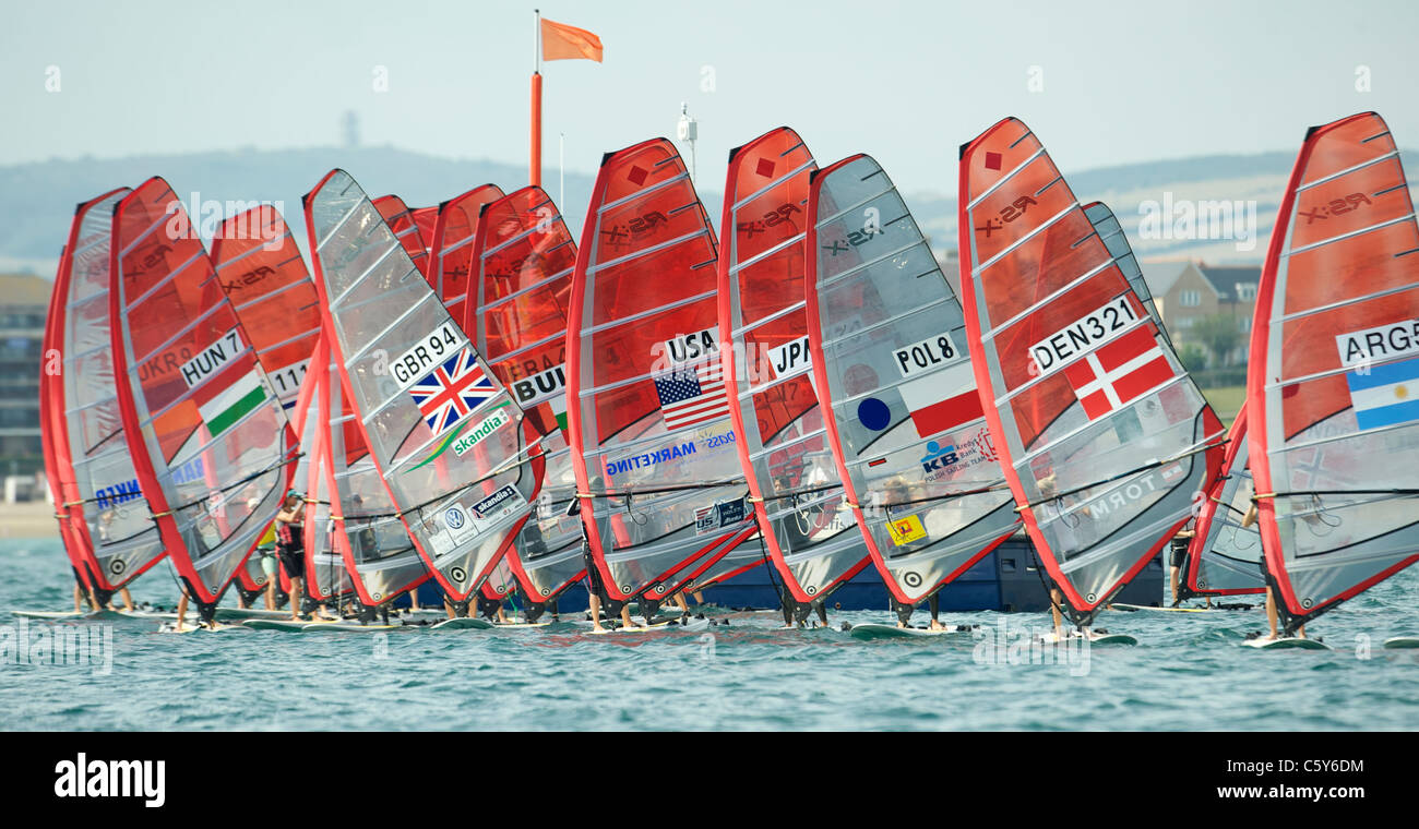 Boarders pull away from the start, RSX women's windsurfer, Sailing