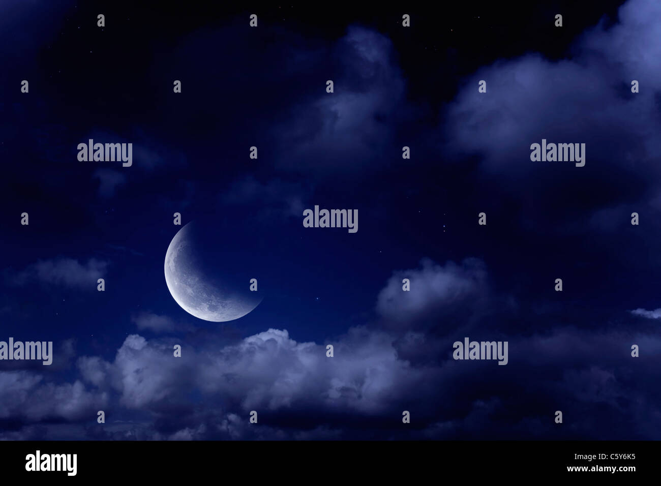 Night landscape with the moon in a cloudy sky Stock Photo - Alamy