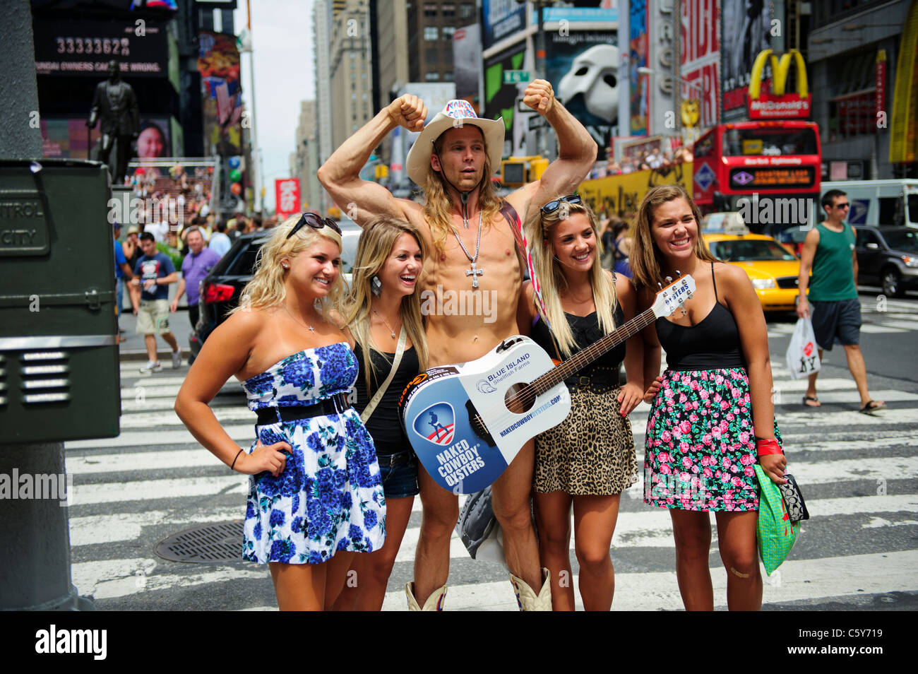 Naked girls in manhattan Naked Cowboy Entertainer With Tourists In Times Square New York City Manhattan United States Stock Photo Alamy
