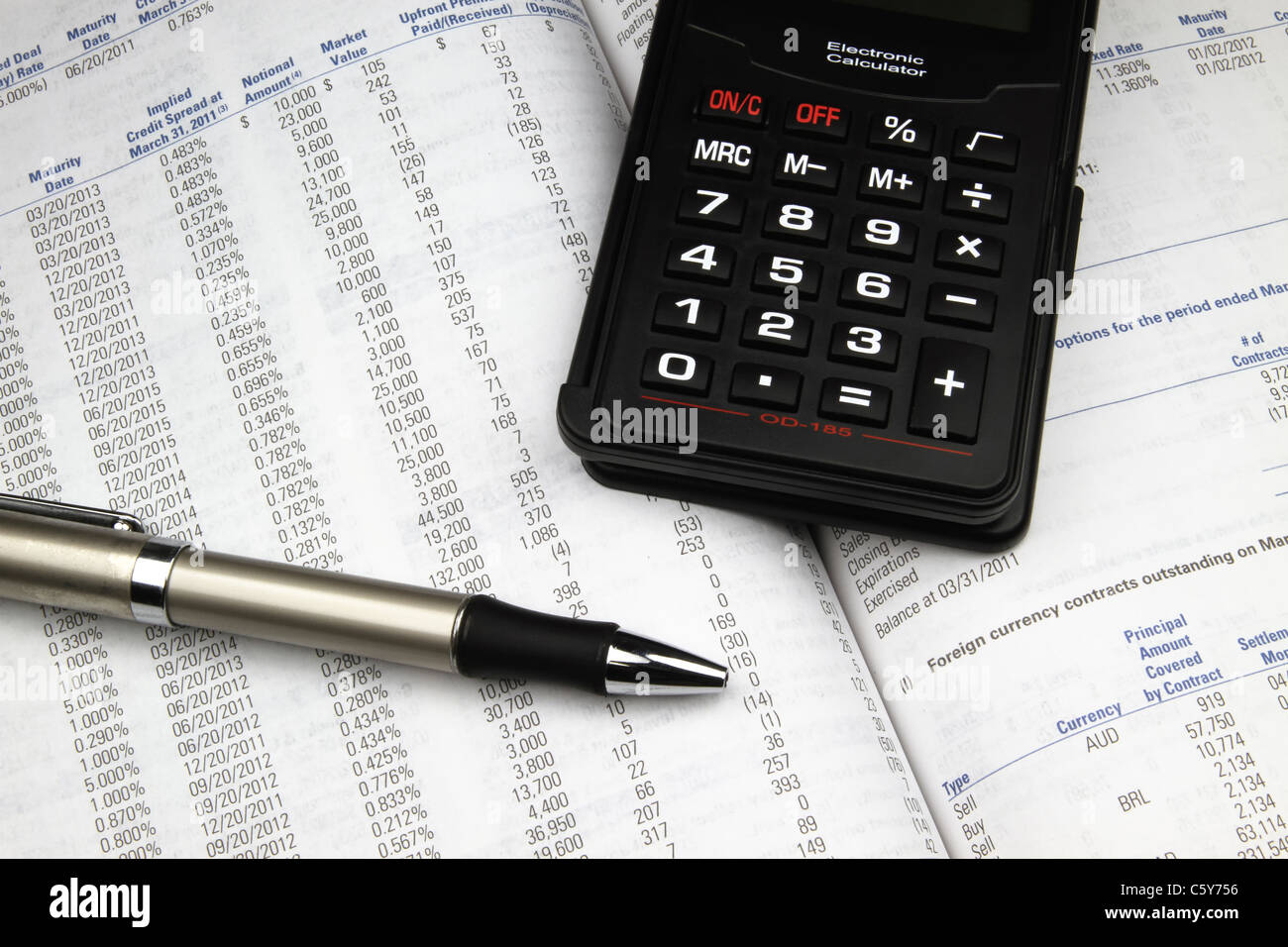 Analyzing an investment annual report Stock Photo Alamy