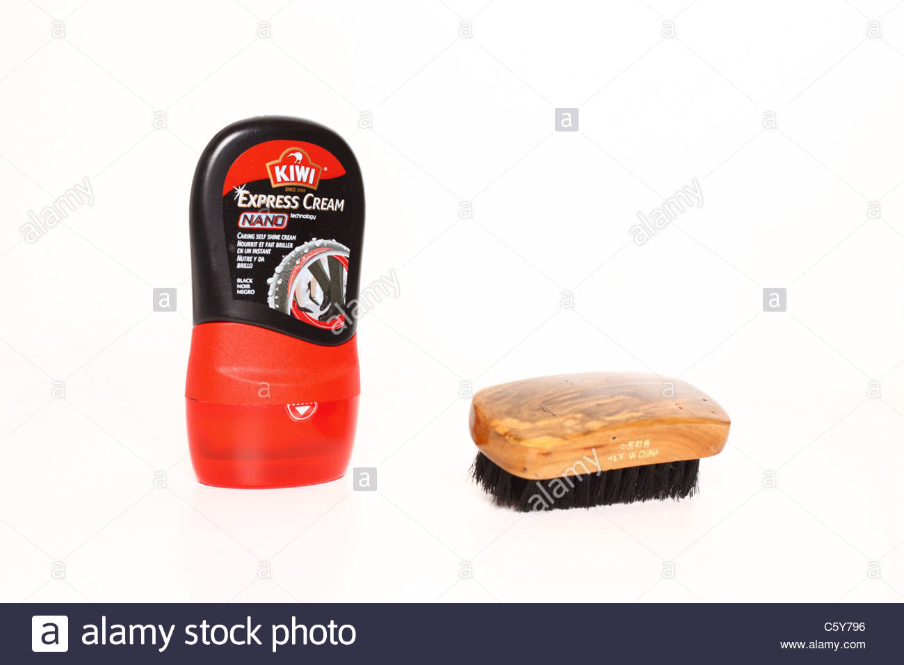 Shoe polish and brush Stock Photo Alamy