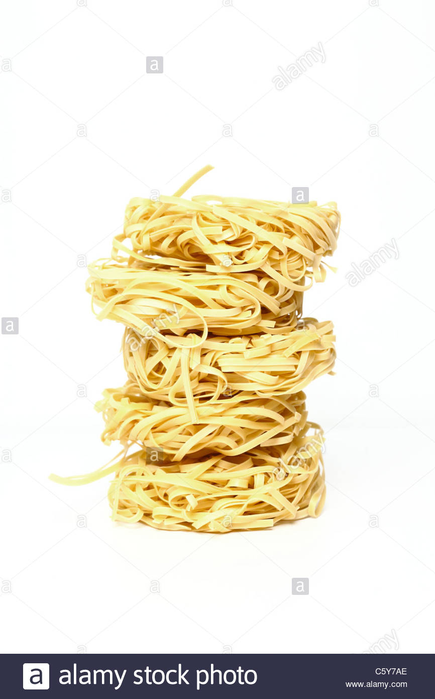 Egg noodles nests Stock Photo Alamy