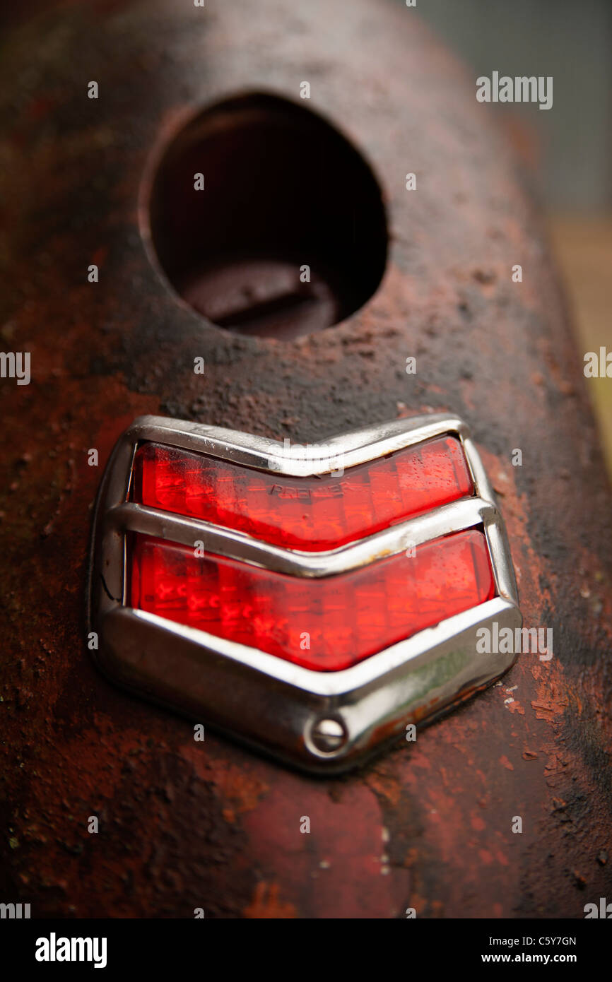 american pickup tail light and fuel filler cap brown rusty fender wing Stock Photo