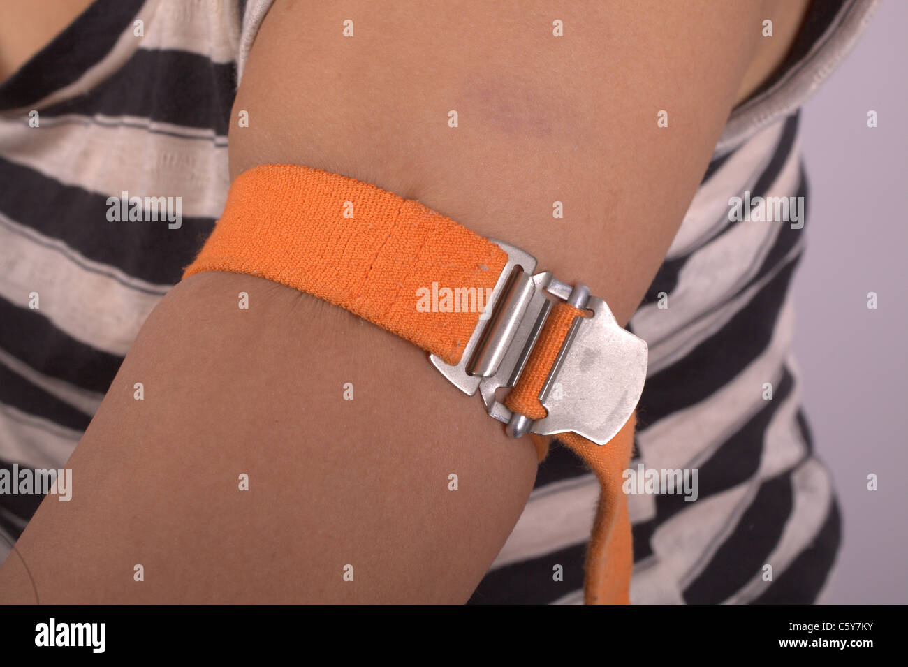 Tourniquet applied prior to blood test Stock Photo Alamy