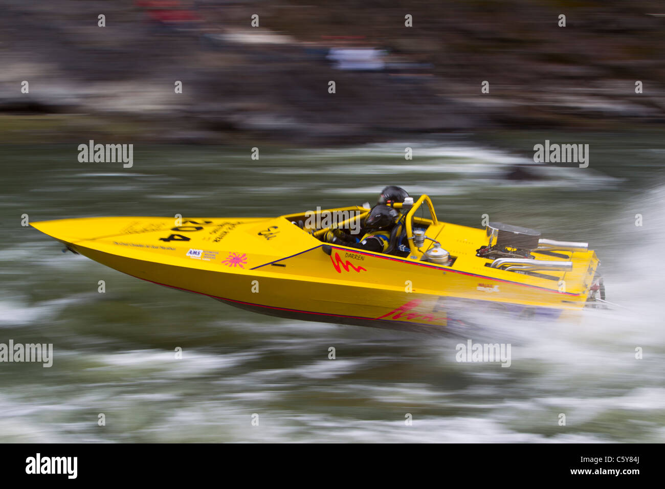 Yellow jet boat number 204 races downriver during the Salmon River Jet