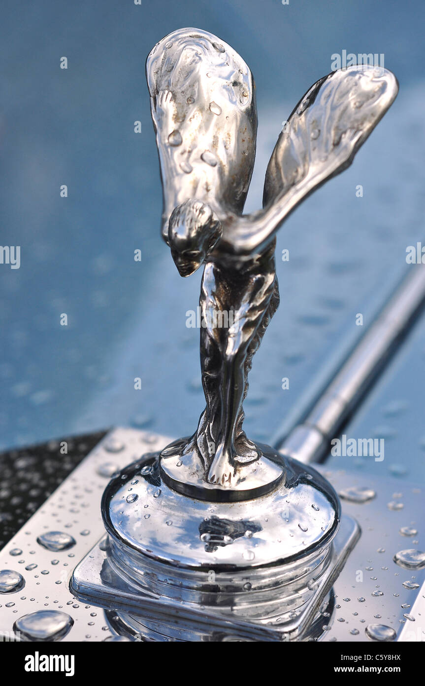 Rolls Royce Spirit of Ecstasy radiator grill chrome and silver emblem,  speckled with water Stock Photo - Alamy