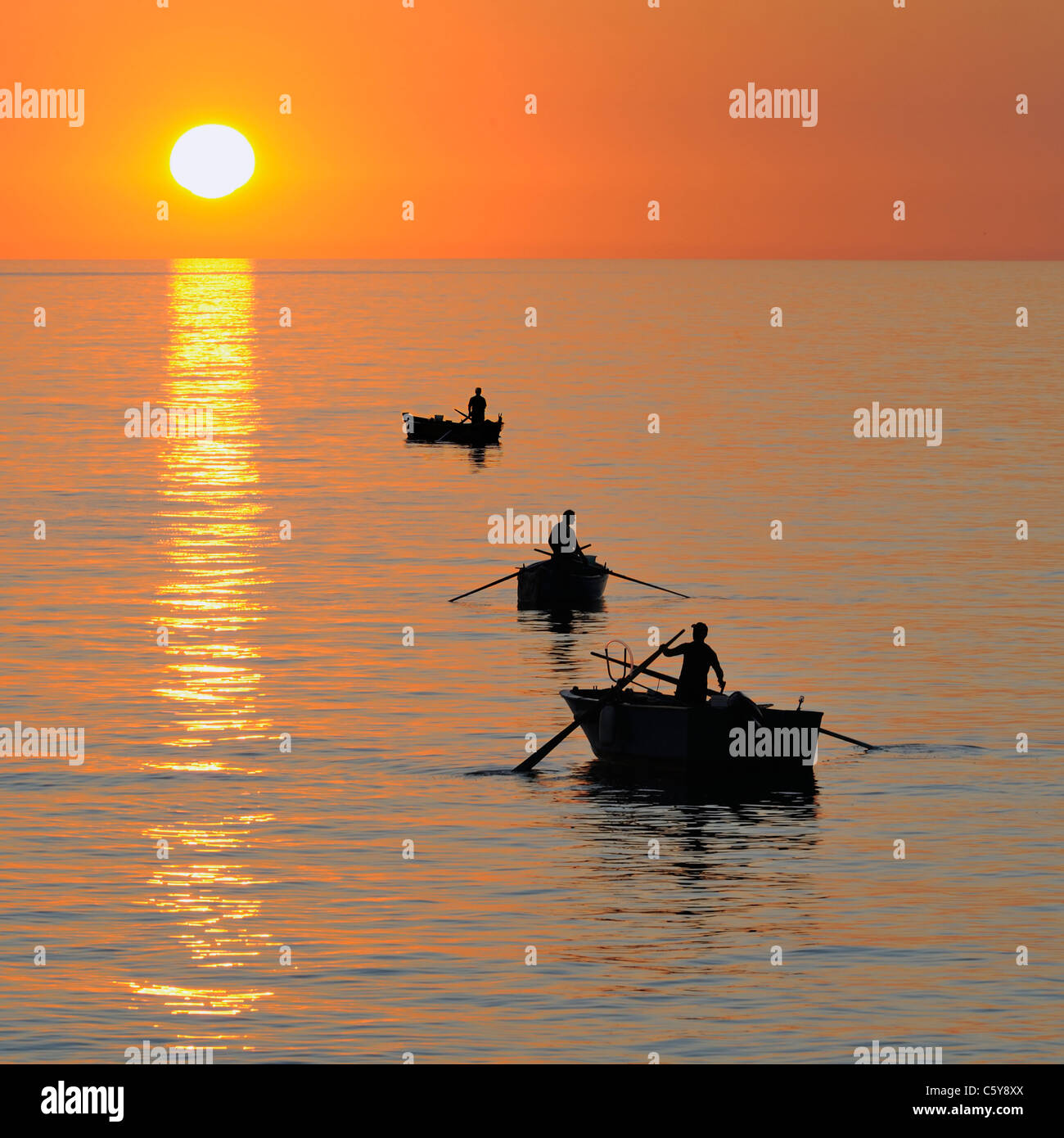 Two men fishing at sunrise High Resolution Stock Photography and Images ...