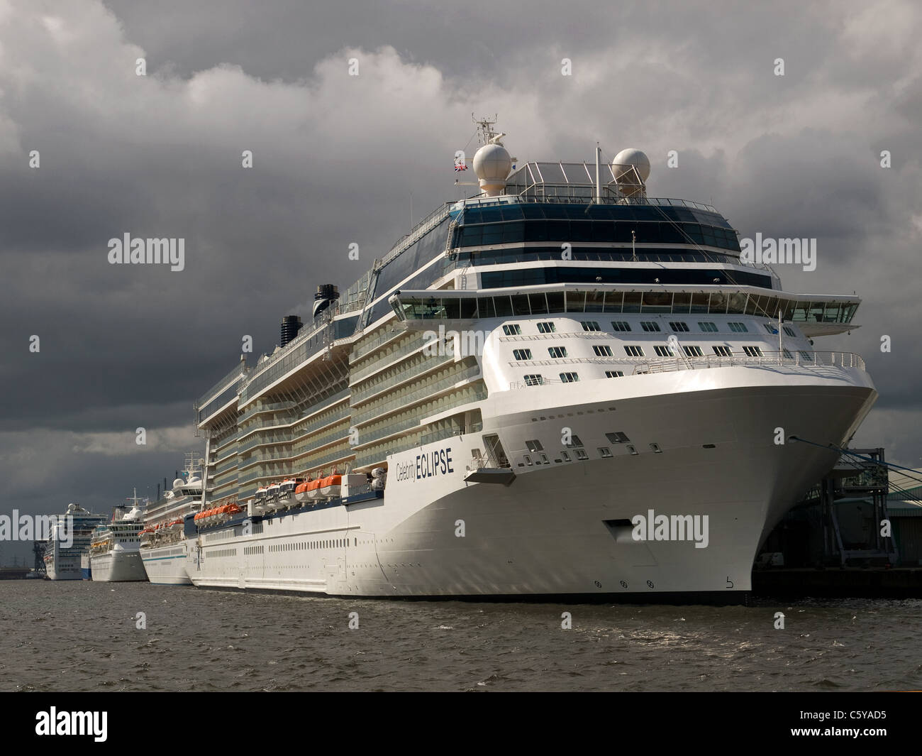 A line of cruise ships in Southampton UK from right to left Celebrity Eclipse, Artania, Balmoral and Crown Princess Stock Photo