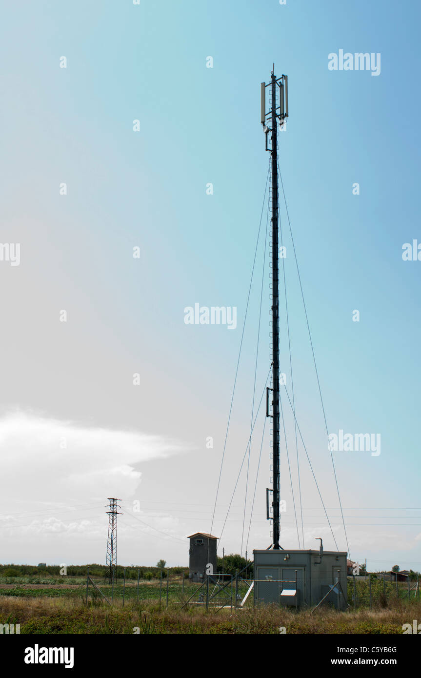 GSM antennas on blue sky background Stock Photo Alamy