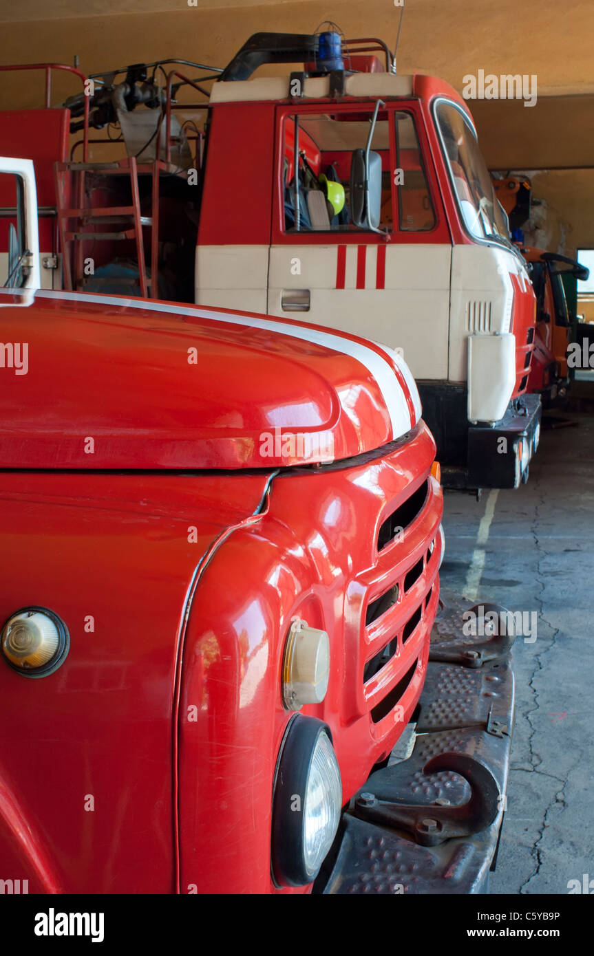 Two Old fire trucks, fire hoses and equipment Stock Photo
