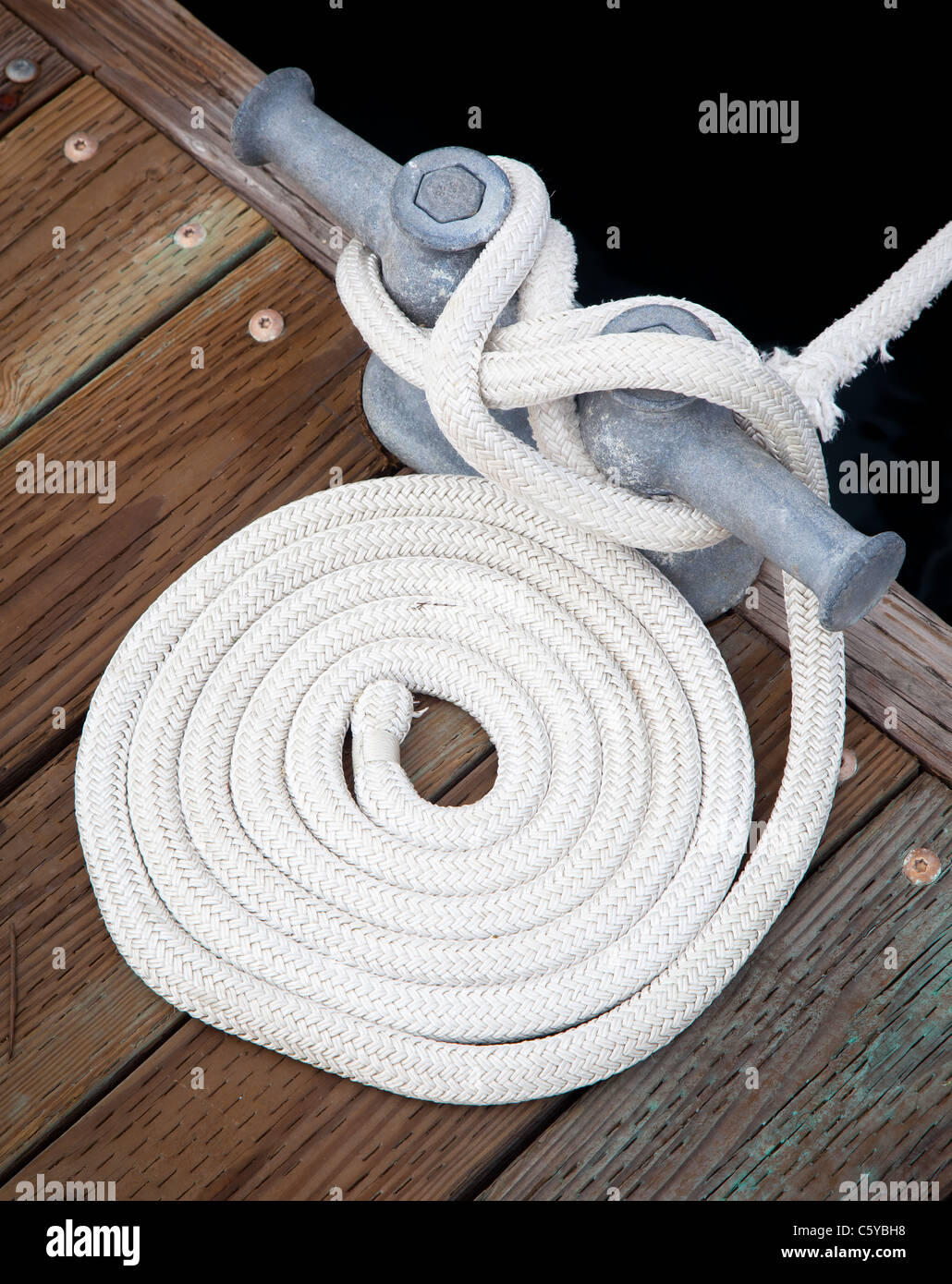 Rope used to tie up a boat to the dock in Roche Harbor, San Juan Island in Washington state, USA Stock Photo