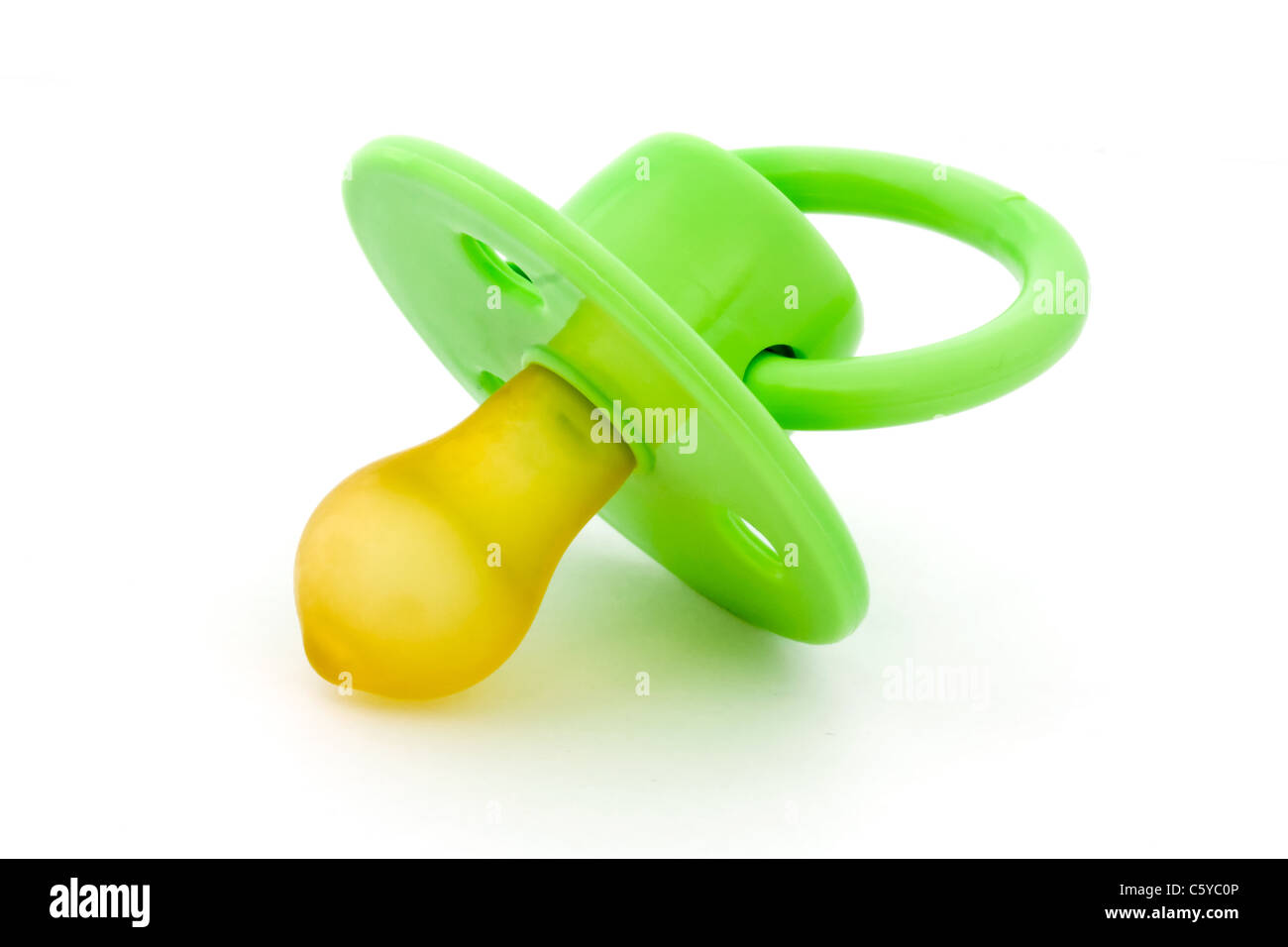 Green baby's dummy isolated on white Stock Photo