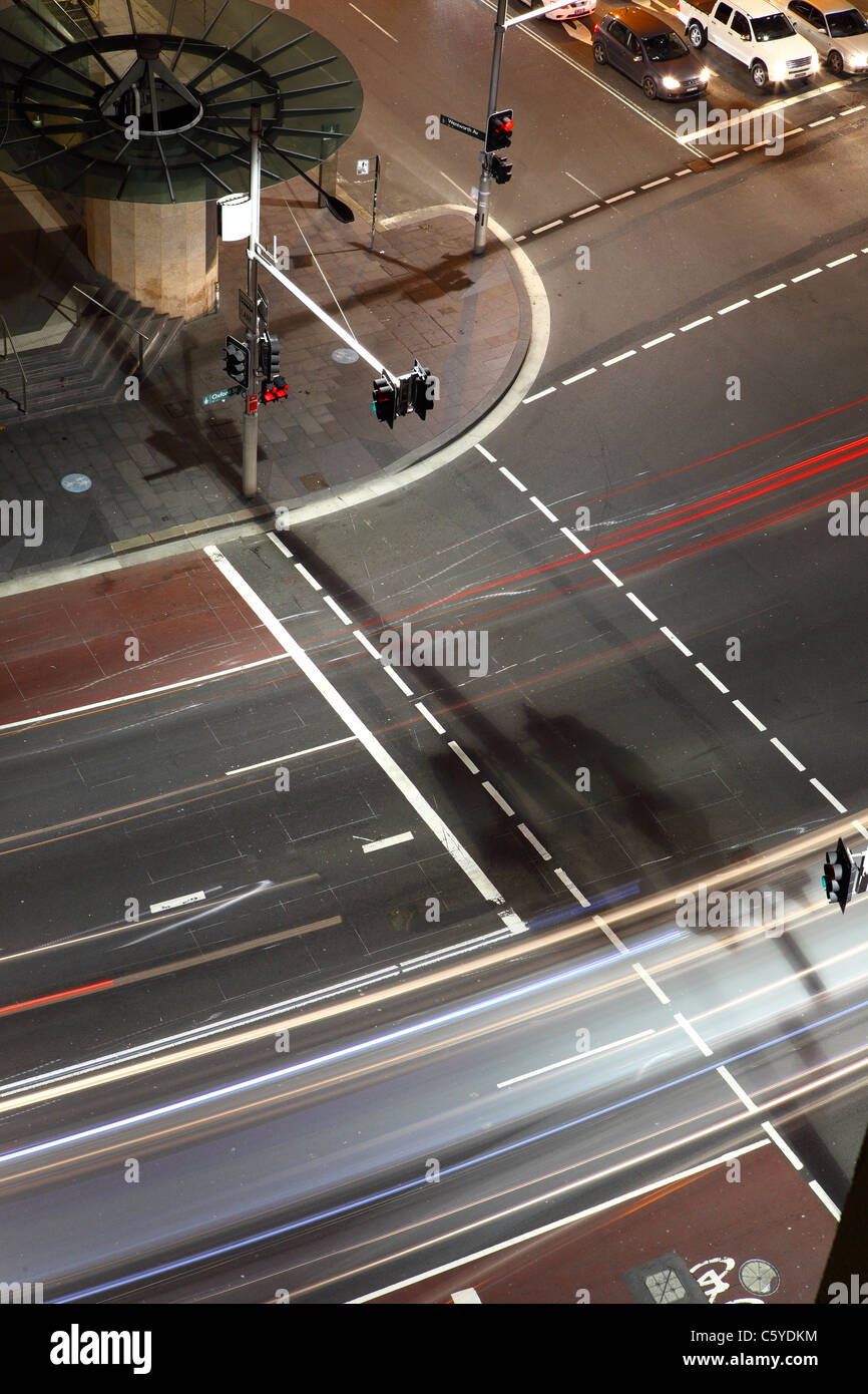 Night time traffic at the junction of Oxford Street and Liverpool Street in the south east corner of Sydney CBD Sydney Australia Stock Photo