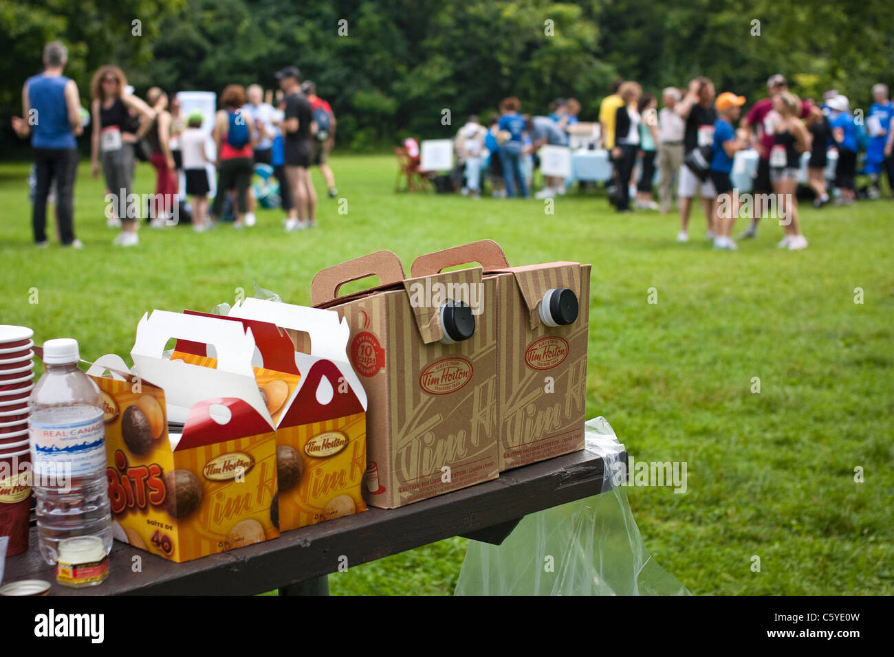 Tim Horton's Timbits boxes (10 pack) at a picnic table Stock Photo