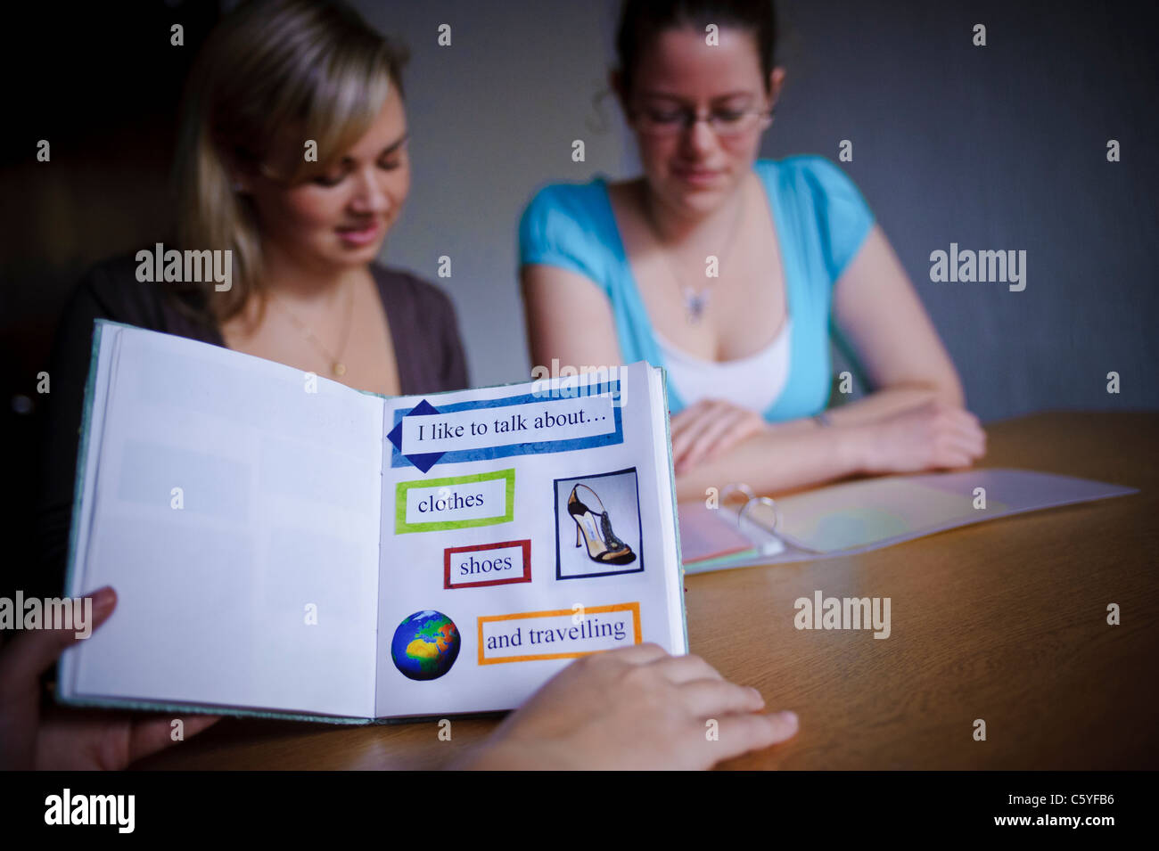 speech and language therapists SLT sat around table training with