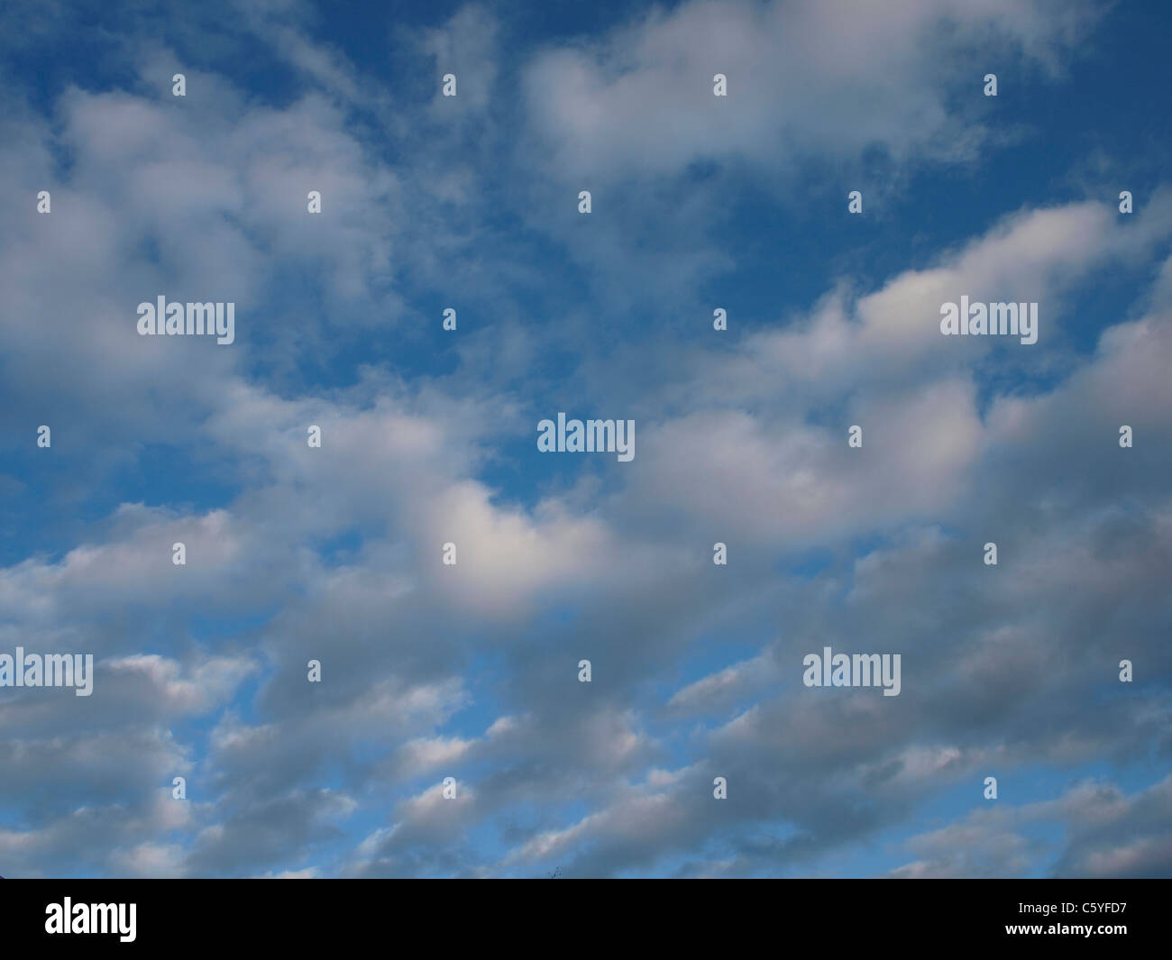 Nice blue evening sky with clouds, diagonal Stock Photo