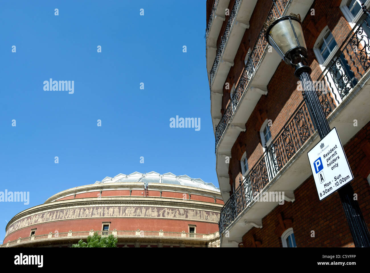 roof of the albert hall and apartment block in matching style on kensington gore, london, england Stock Photo
