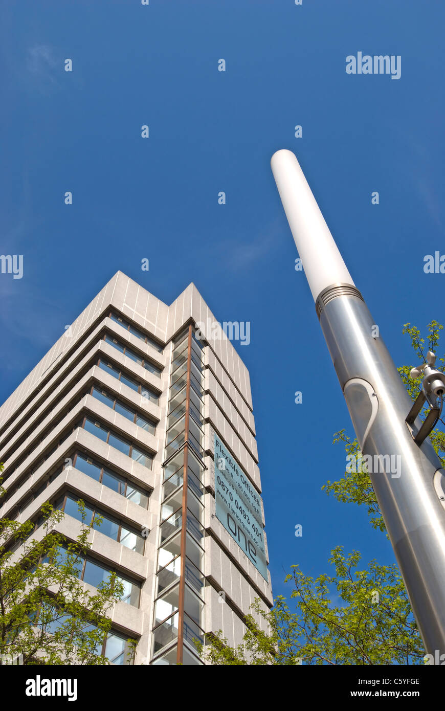 street lighting pillar and high rise office building in lyric square