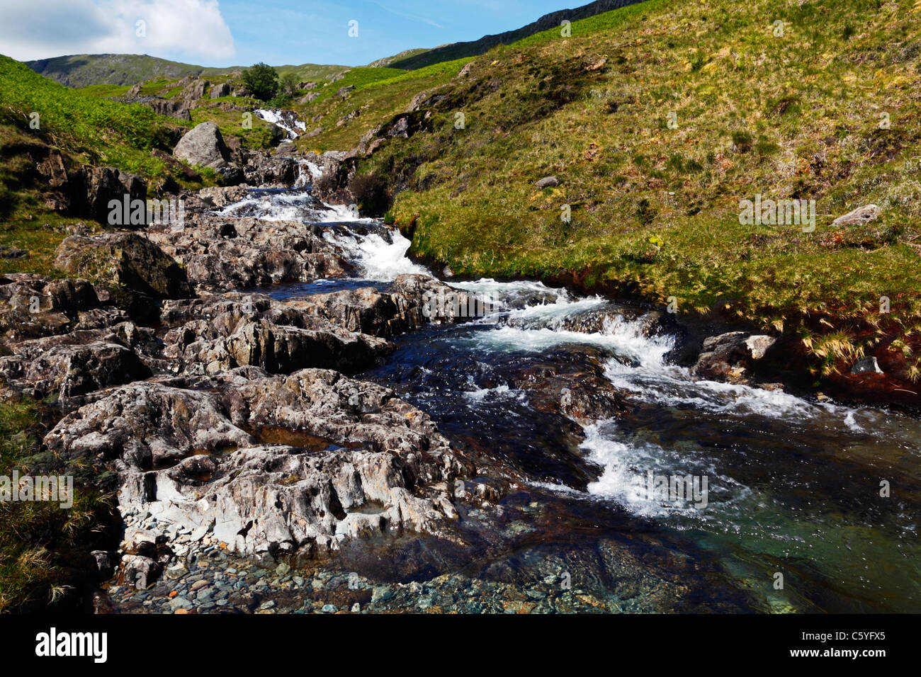 Waterfall on Greenburn Beck between Langdale and Coniston in the Lake District, Cumbria, England. Stock Photo