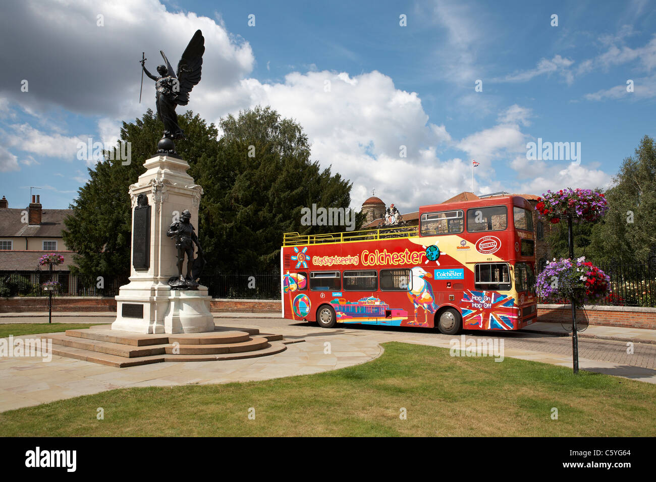 Colchester Essex Summer Open Sightseeing Bus outside Castle Museum and Park Stock Photo