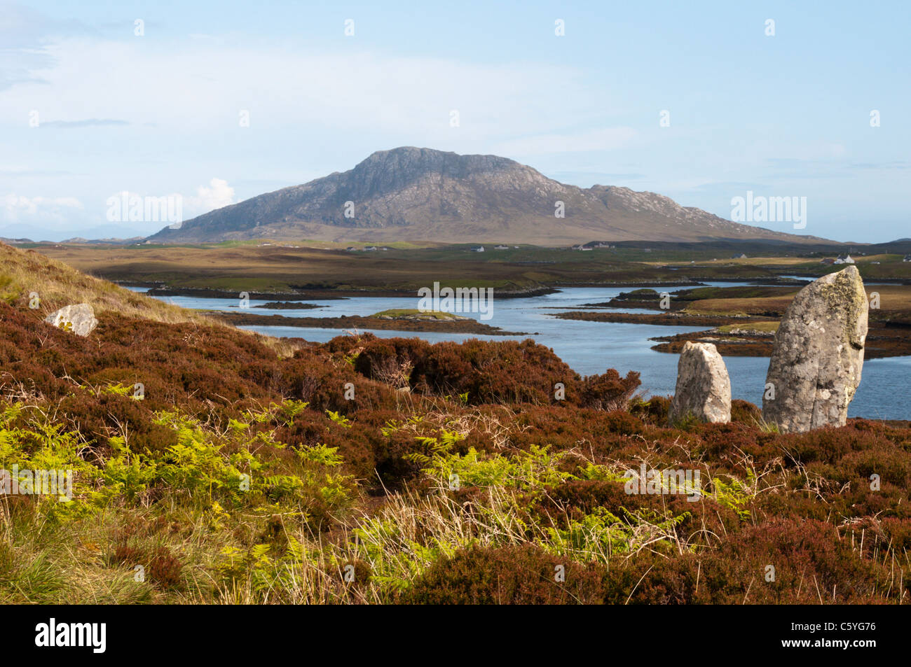 The stone circle of Pobull Fhinn or Finn's People above Loch Langais with Eabhal in the background, on North Uist. Stock Photo