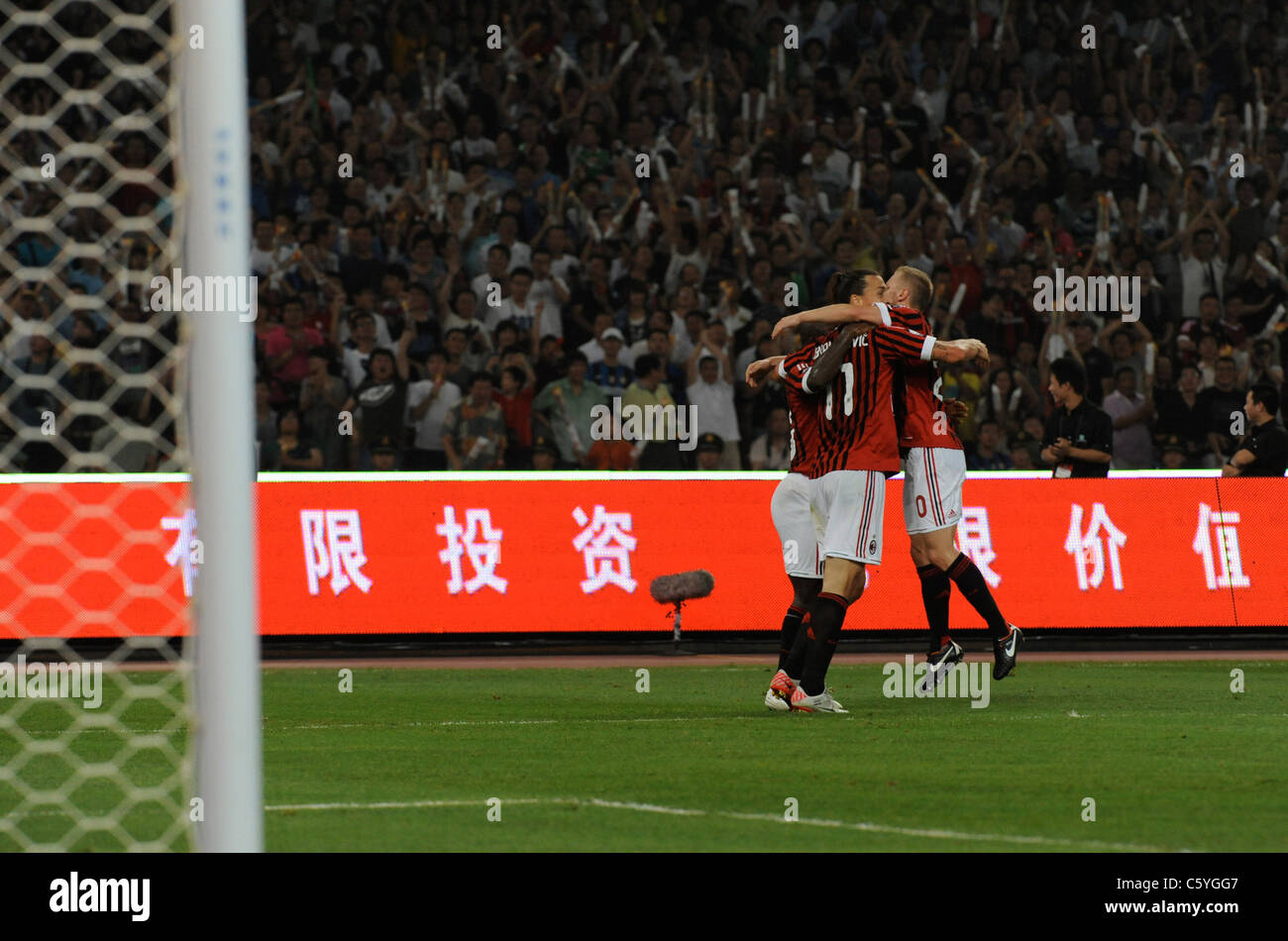 Zlatan Ibrahimovic of AC Milan, left, celebrates with his teammates