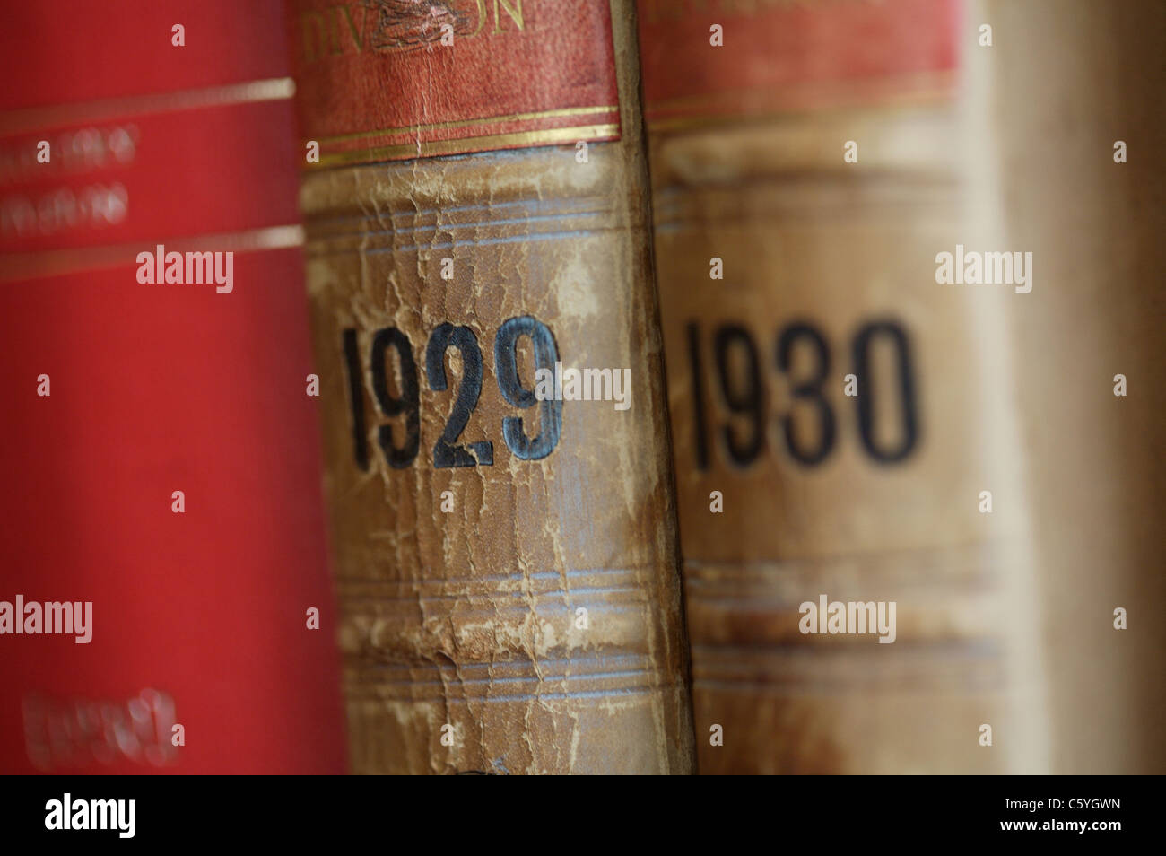 Old book spines showing 1929 and 1930 Stock Photo