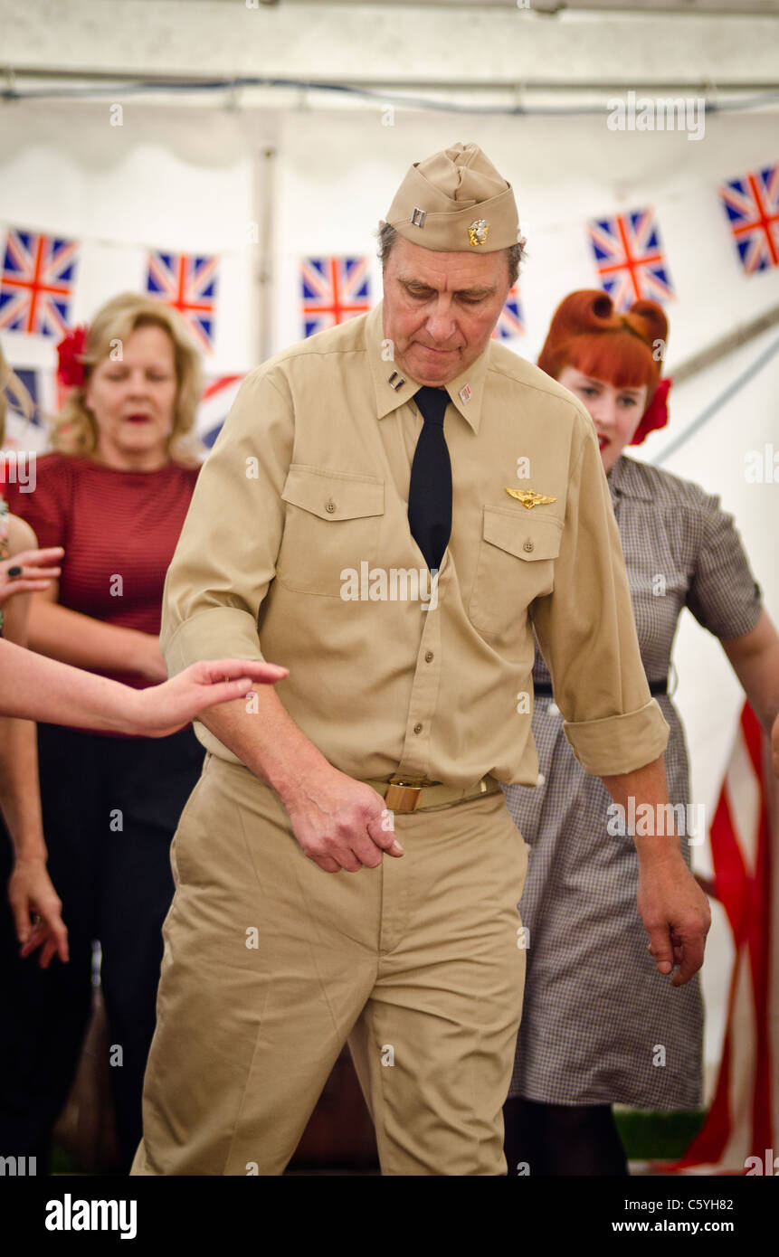 re-enactment WWII people in 1950's clothes dancing the Jive Stock Photo