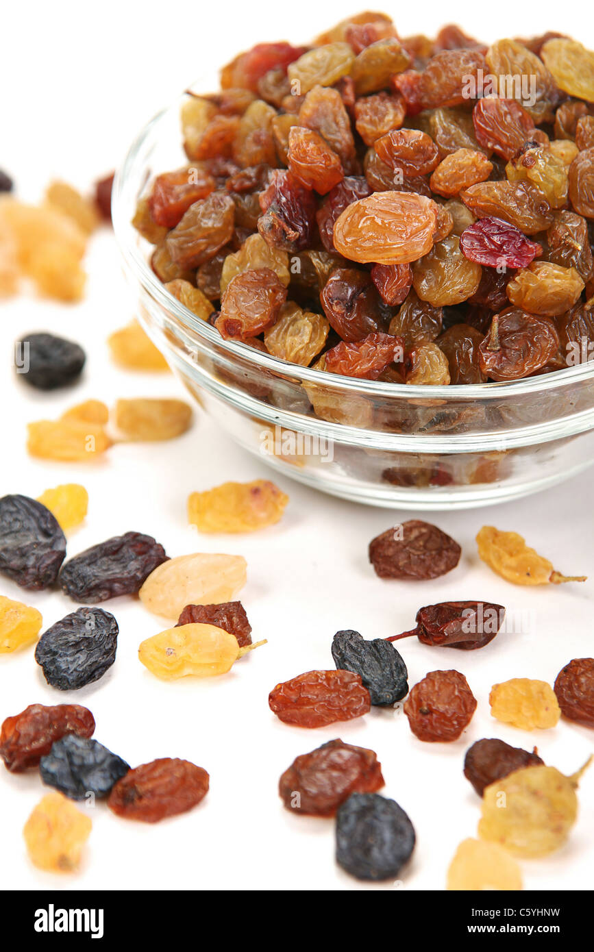 Raisin dried fruit in glass plate on white Stock Photo Alamy