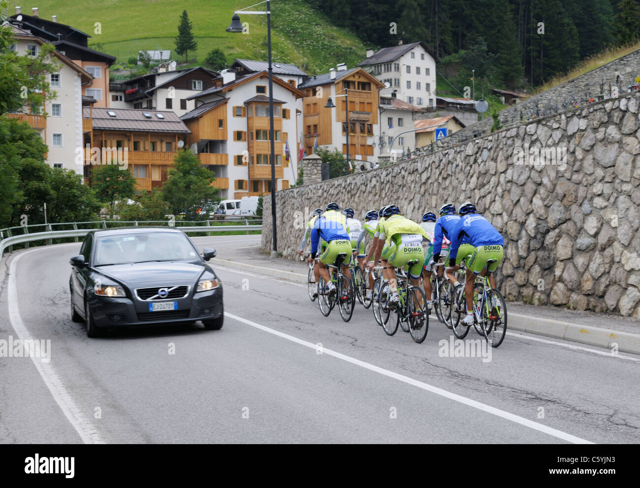 Cyclists on a road in Livinallongo del Col di Lana, Veneto, northern Italy Stock Photo