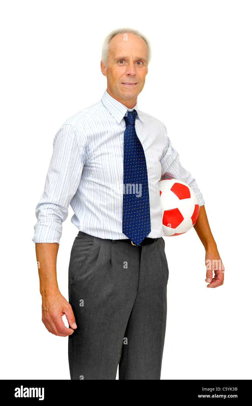 Businessman with a soccer ball isolated in white Stock Photo - Alamy
