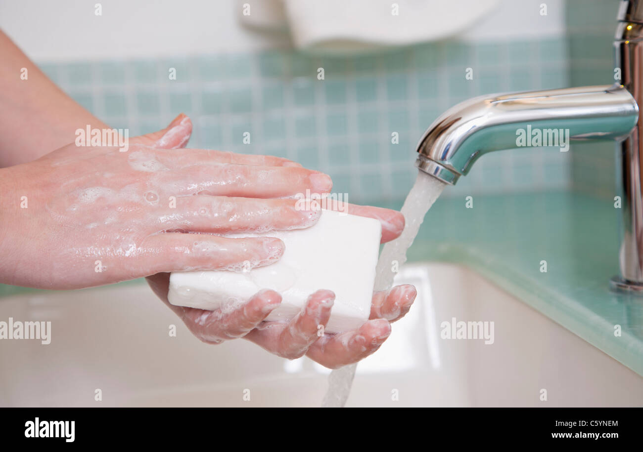 Close up woman holding bar soap hi-res stock photography and images - Alamy