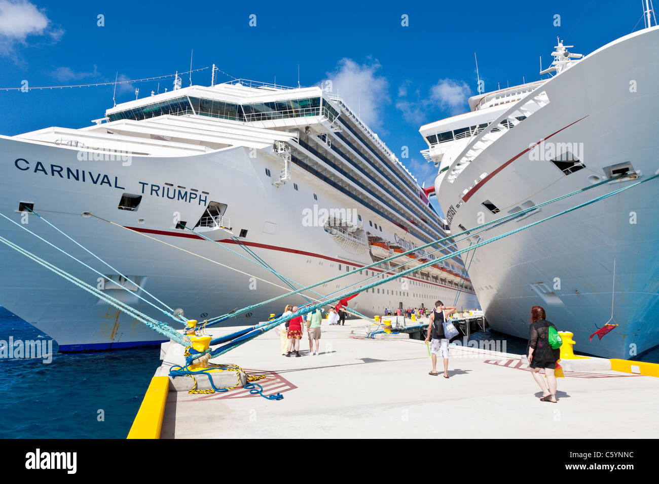 Cruise Ship Passengers On Pier Near Carnival Cruise Ships Triumph And Ecstasy In Cozumel Mexico In The Caribbean Sea Stock Photo Alamy