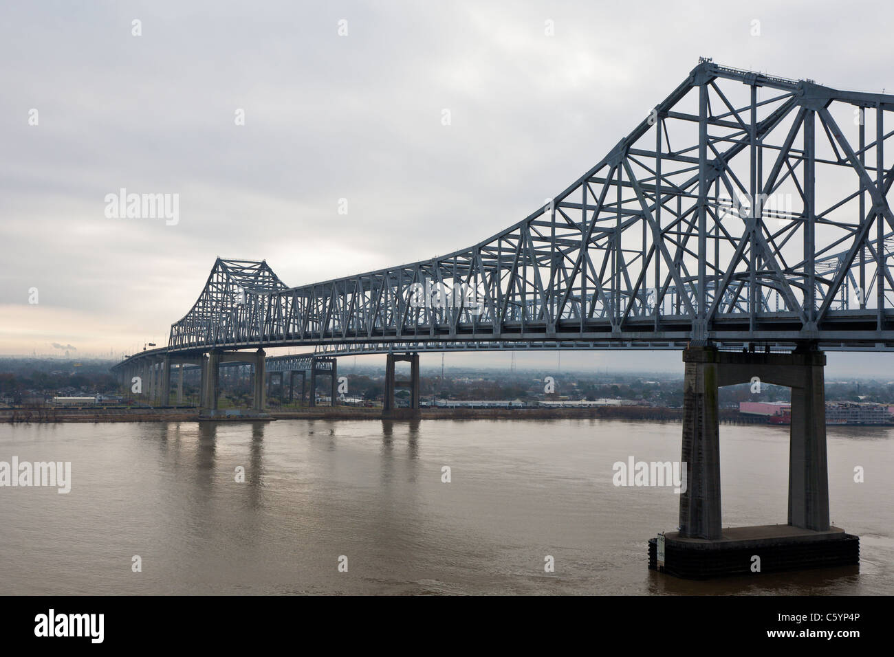 Steel bridge over Mississippi River in downtown New Orleans, Louisiana Stock Photo