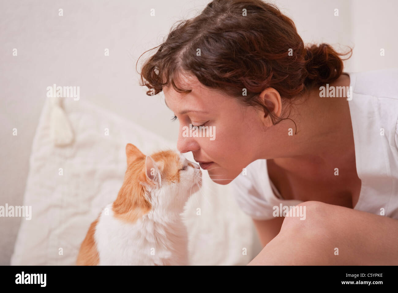 Russia, Voronezh, woman and cat rubbing noses Stock Photo Alamy