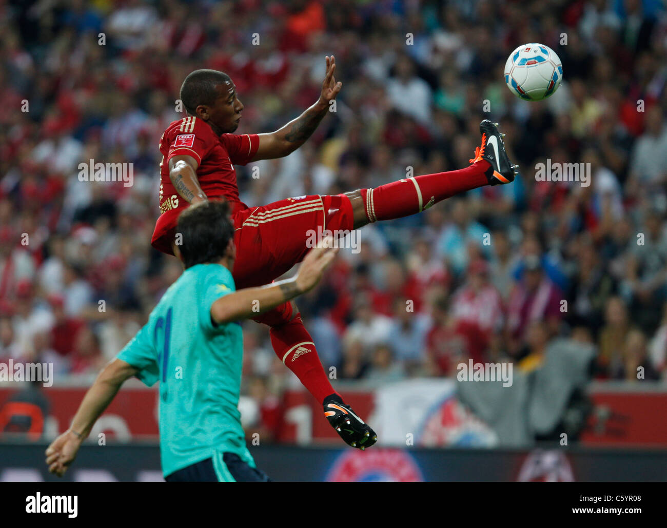 FC Bayern player Jerome Boateng in action Stock Photo